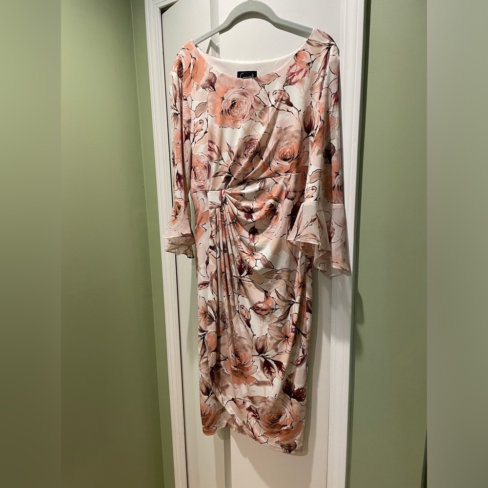Faux wrap dress with bell sleeves. Lovely springtime dress. Size 14.